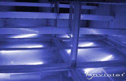 UV-disinfection of industrial cooling towers